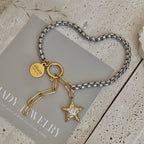 Star charm two tone silver and gold ombré pendant bracelet