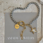 Star charm two tone silver and gold ombré pendant bracelet